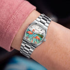 Bulova Super Seville Mini Havana — Cushion case and integrated three-link bracelet angled on the wrist, with the hand-painted lagoon scene in view on the custom dial, bespoke by IFL Watches.