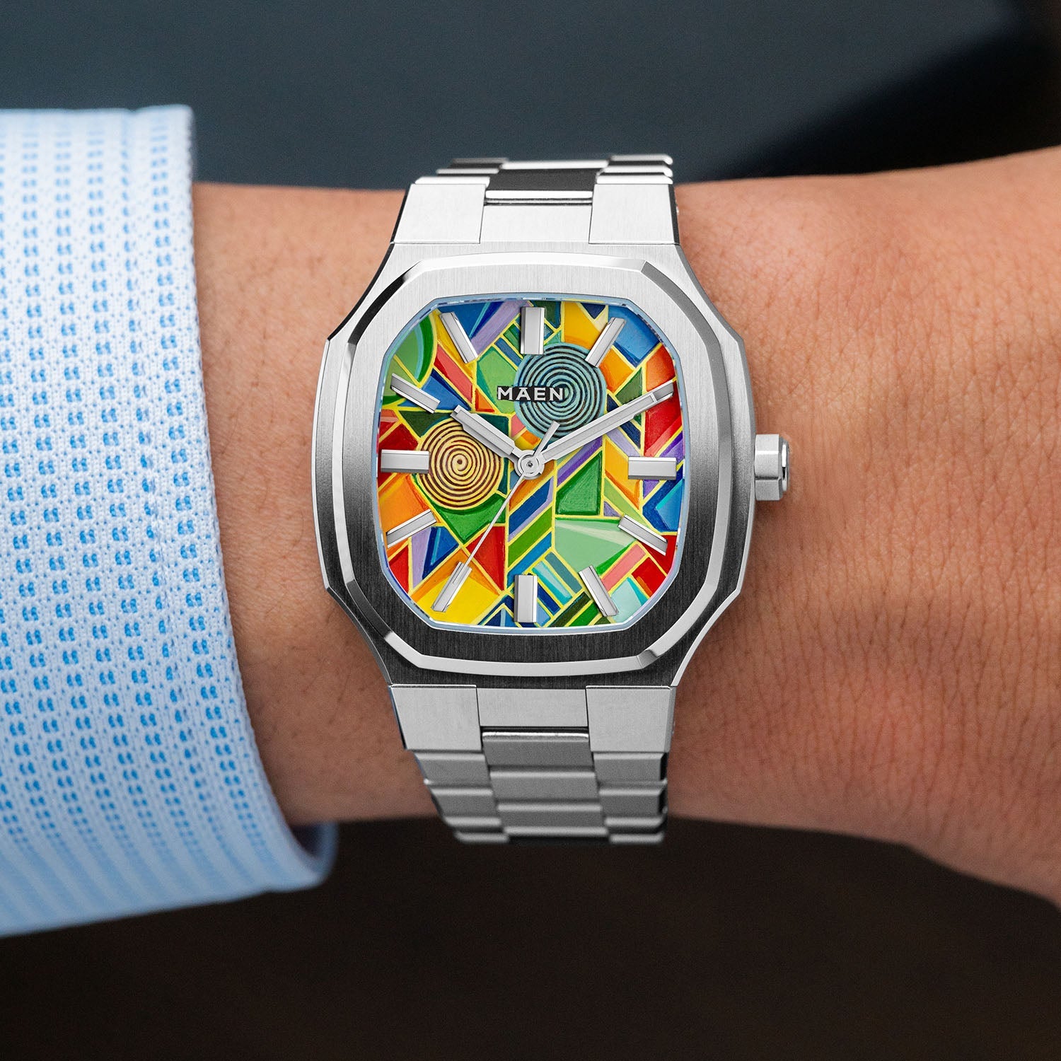 MAEN Manhattan Paradox — angled studio view of the 37mm octagonal stainless steel case and integrated bracelet paired with the geometric color-block dial, limited edition timepiece by IFL Watches.