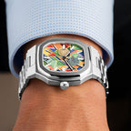 MAEN Manhattan Paradox — hand-painted geometric color-block dial with chevrons, mesh, and two concentric disks on a 37mm octagonal stainless steel case with integrated bracelet, limited edition timepiece by IFL Watches.