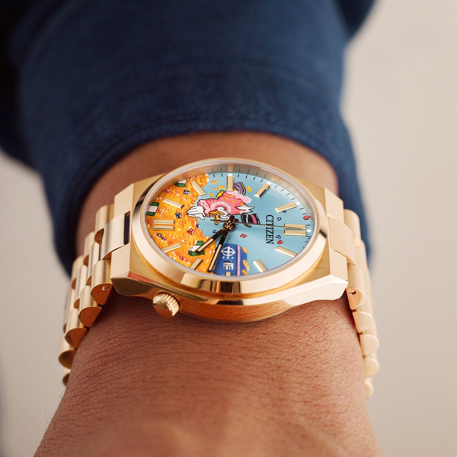 Citizen Tsuyosa Dive in Time on wrist — top-down view of the hand-painted treasure vault artwork on a rose gold Citizen Tsuyosa Automatic with date window and matching bracelet, a bespoke timepiece by IFL Watches.