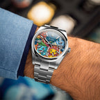 Dream Team Concept: Evolution — Hand-painted bespoke timepiece featuring four colorful pop art figures rendered in glittering mosaic-tile style on a blue 41mm custom automatic dial by IFL Watches