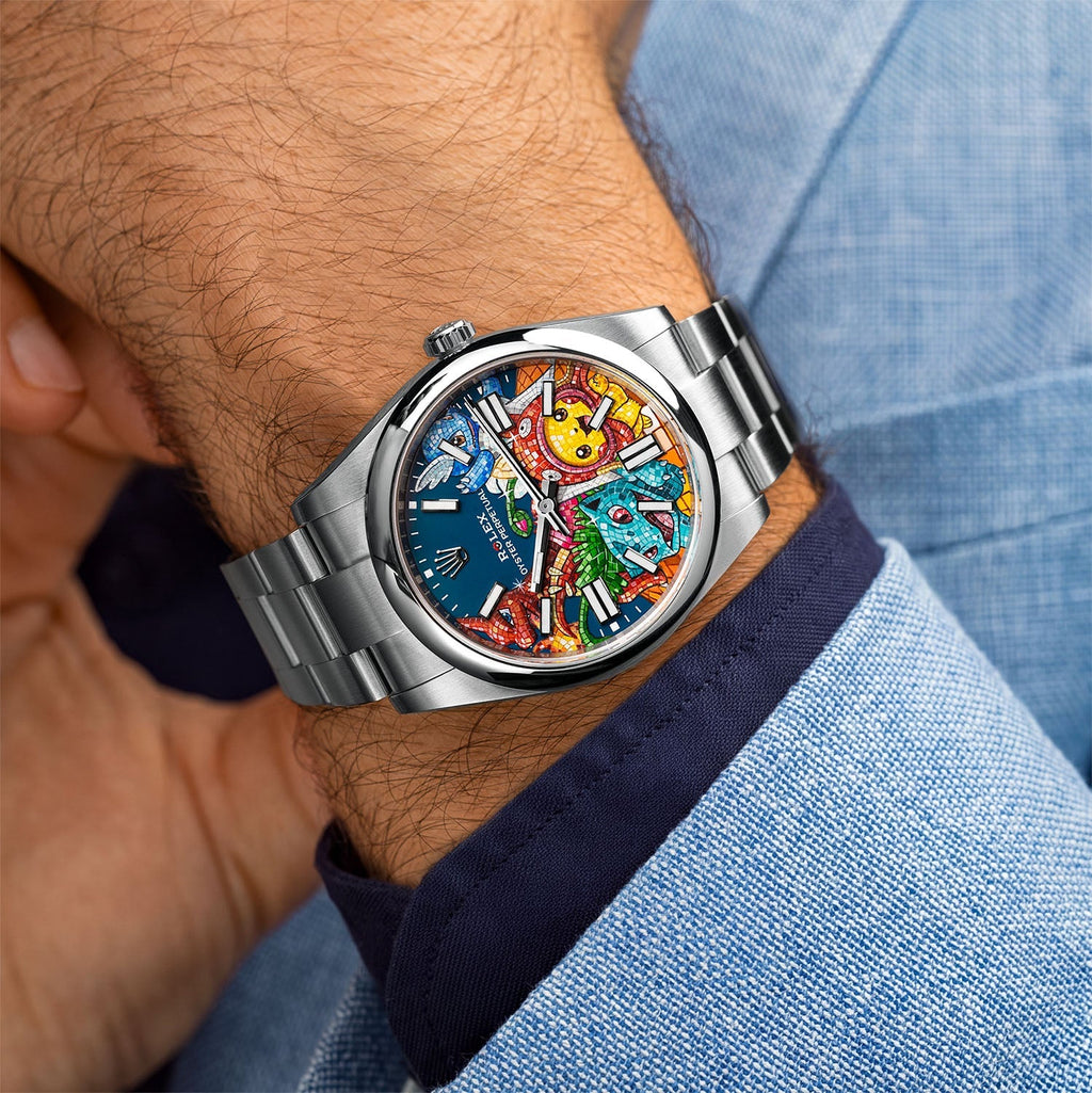 Dream Team Concept: Evolution — Hand-painted bespoke timepiece featuring four colorful pop art figures rendered in glittering mosaic-tile style on a blue 41mm custom automatic dial by IFL Watches