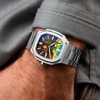 MAEN Manhattan Memento — Worn below a rolled shirt cuff, the hand-painted custom dial set at an angle, its landscape of soft watches framed by the brushed octagonal case and integrated bracelet, customized exclusively by IFL Watches.
