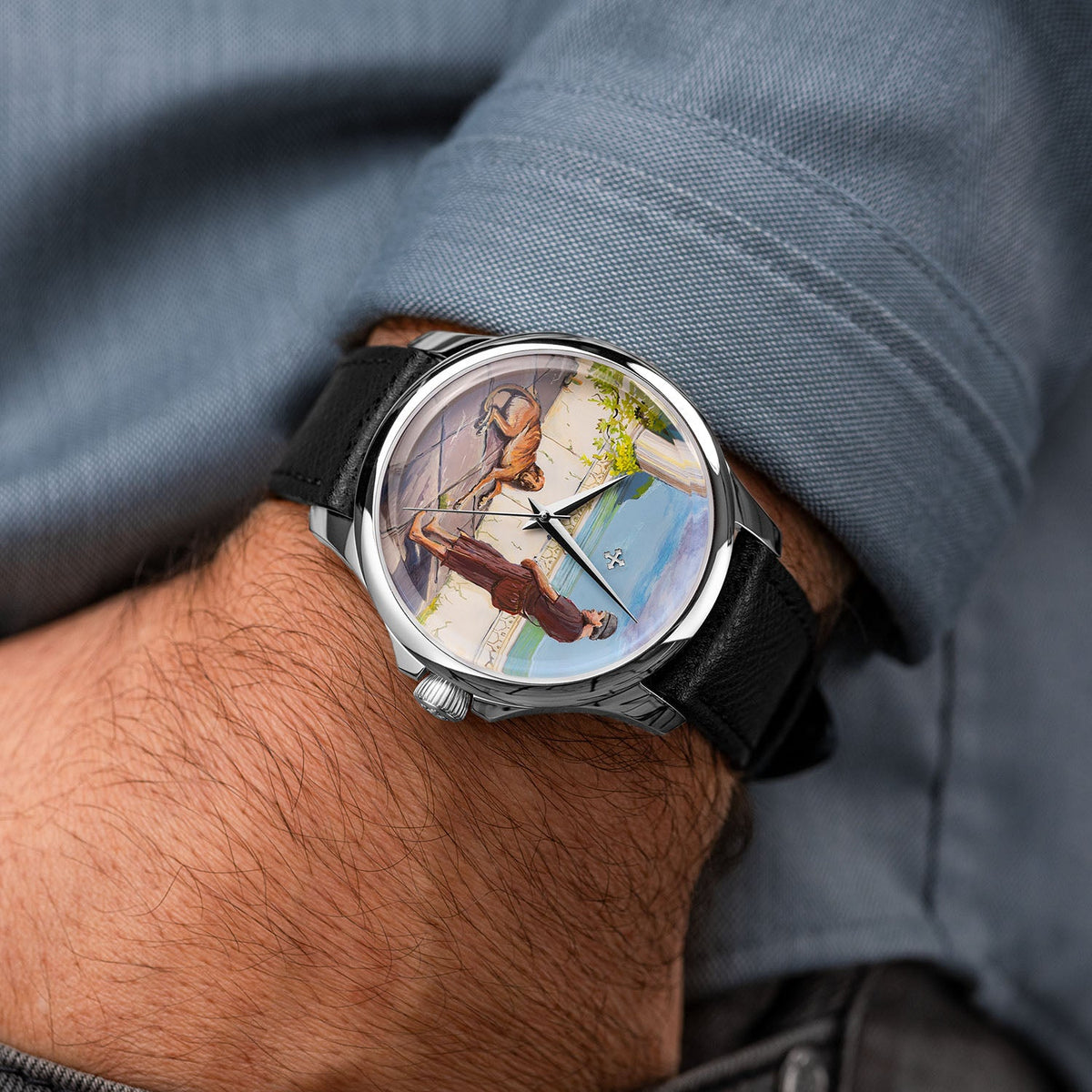 Venezianico Redentore Ulysses & Argus — Worn below a rolled shirt cuff, the hand-painted custom dial set at an angle, its Odyssey scene of a traveler and his dog framed by the round steel case, customized exclusively by IFL Watches.
