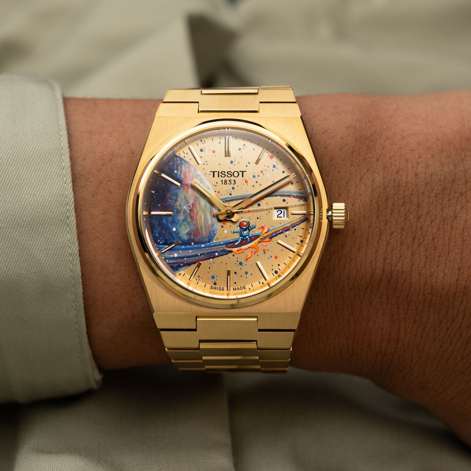 PRX Gold Surfer Concept—hand-painted custom dial with astronaut artwork on a gold-coated 40mm Tissot PRX by IFL Watches.