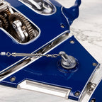 Mecha Ray Blue — detail of the gear cluster and turnbuckle that drive the wing, set into riveted bodywork, kinetic sculpture by IFL Watches.