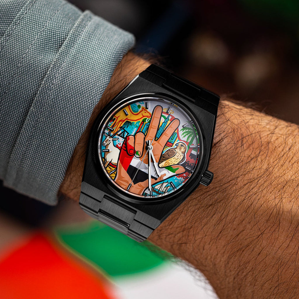 IFL Canvax UAE Unity — Hand-painted custom Canvax featuring the UAE three-finger salute with golden falcon, Arabian oryx, desert camel, and Dubai skyline on a 40mm black matte automatic, a bespoke timepiece by IFL Watches.