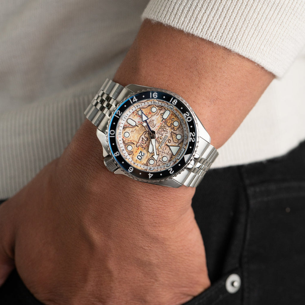 Explorer Concept – Hand-painted custom Seiko 5 GMT featuring ancient map artwork, a limited edition bespoke timepiece by IFL Watches