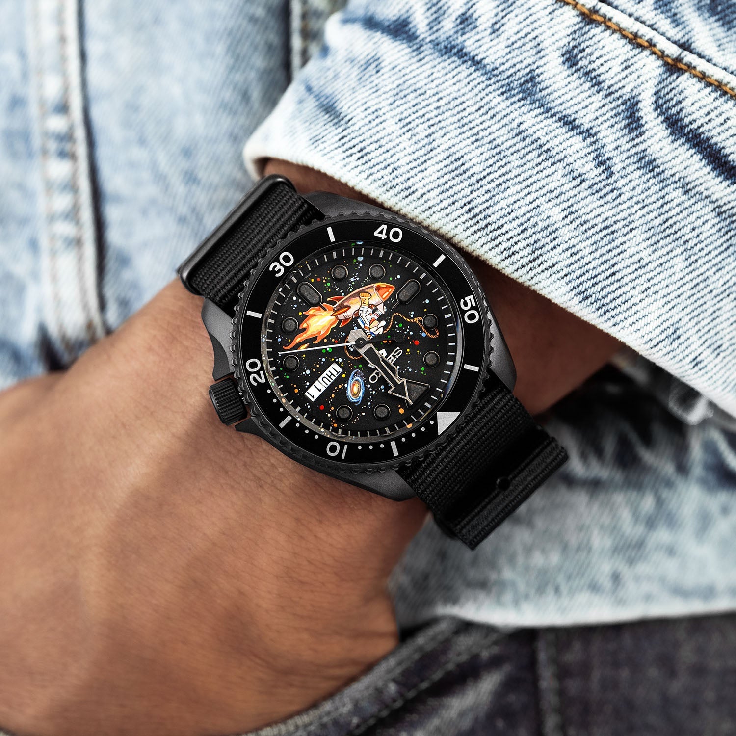 Space Cowboy Concept – Hand-painted custom Seiko 5 Sports featuring cosmic cowboy riding rocket through space, bespoke timepiece by IFL Watches