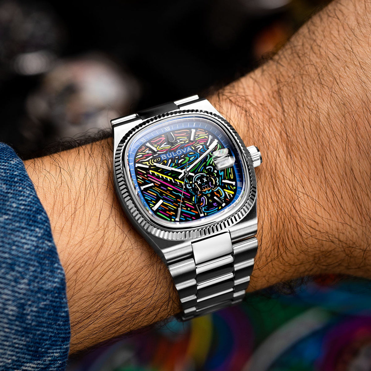 Bulova Super Seville Scream — Angled wrist shot showing the TV-shaped case and a dial of swirling color, limited edition timepiece by IFL Watches