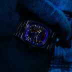 Bulova Super Seville Scream — On the wrist under UV light, neon strokes lighting up across the darkened dial, customized limited edition by IFL Watches