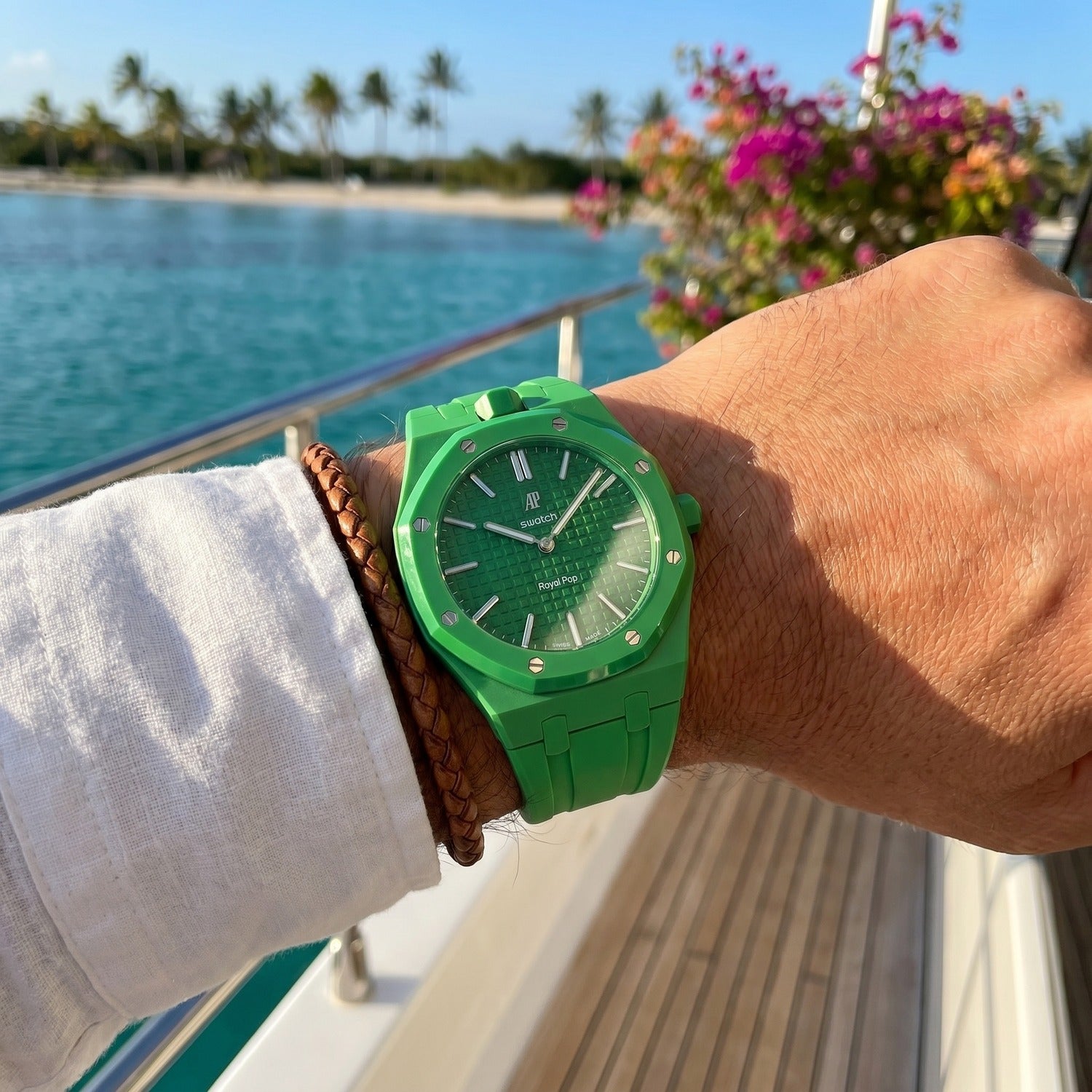 Green Eight Swatch × AP Royal Pop Rubber Case-Strap — worn in a yacht scene, by IFL Watches