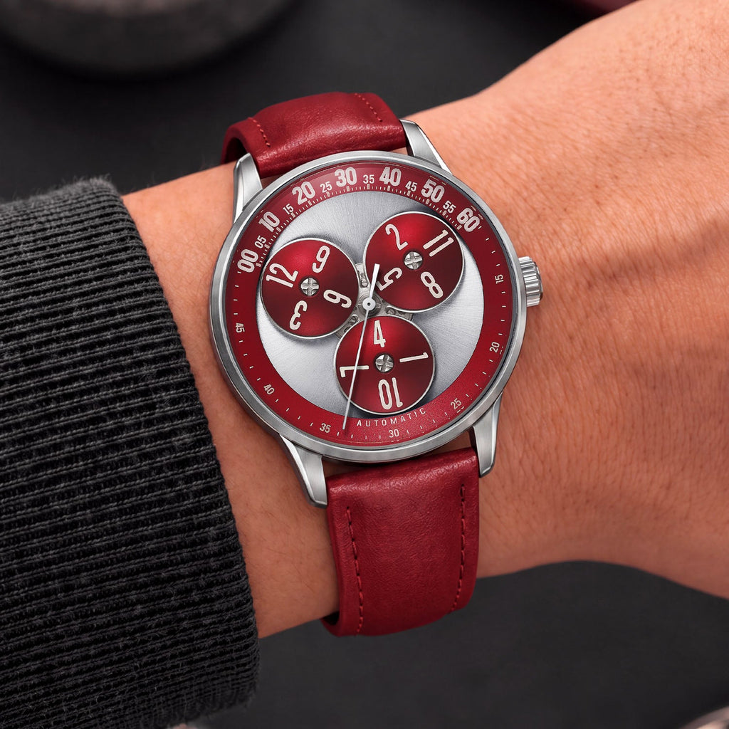 Mandetbrote Wandering Hour Burgundy — Worn on wrist at an angle, showing the minute arc and hour discs, available at IFL Watches.
