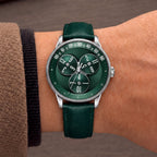 Mandetbrote Wandering Hour Green — Worn on wrist with a camel sleeve, showing the wandering hour display, available at IFL Watches.