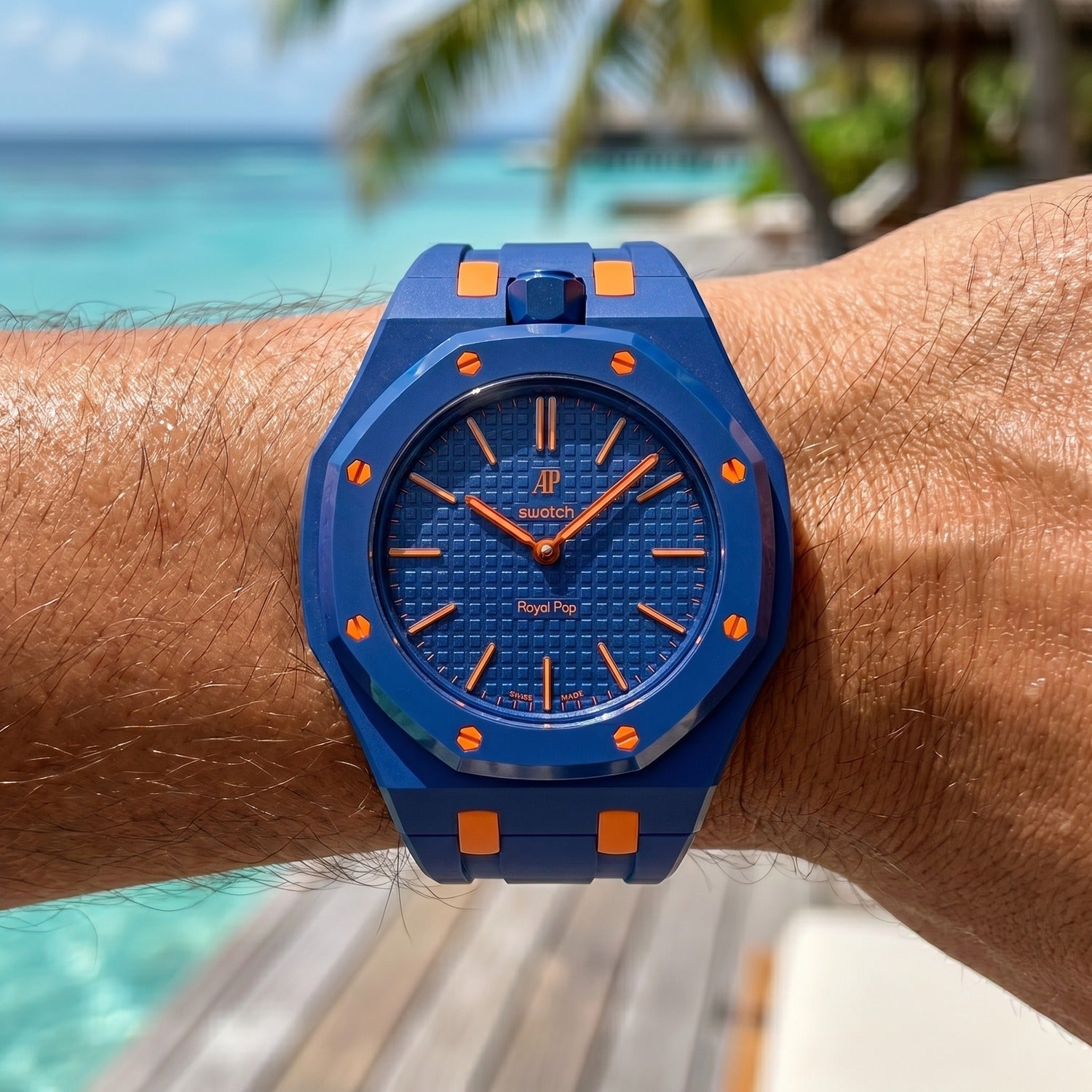 Orenji Hachi Swatch × AP Royal Pop Rubber Case-Strap — worn in a beach scene, by IFL Watches
