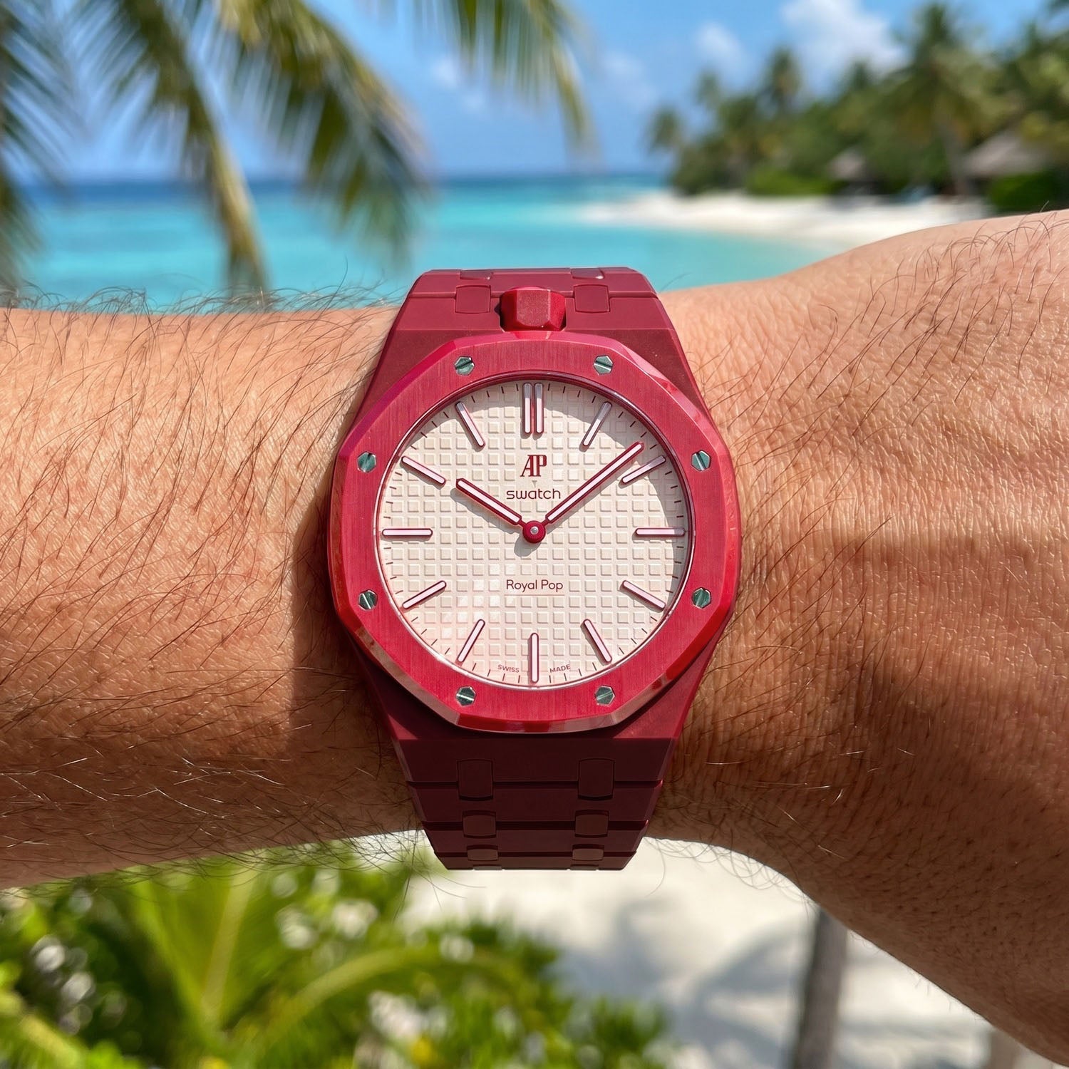 Otto Rosso Swatch × AP Royal Pop Ceramic Case-Strap — worn in a beach scene, by IFL Watches