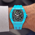 Tsar Bomba Atomic Lake Blue — Worn on wrist with a knit sleeve, showing the tonneau case, available at IFL Watches.