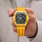 Tsar Bomba Atomic Yellow — Held in hand, showing the open-worked dial and screwed bezel, available at IFL Watches.