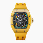 Tsar Bomba Atomic Yellow — Front view of the skeleton dial with power reserve, day, month and AM/PM sub-dials in a 45mm yellow ceramic tonneau case on matching strap, available at IFL Watches.