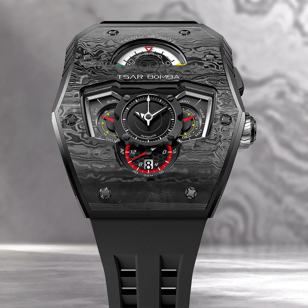 Tsar Bomba Parallax Carbon Black — Front close-up against a dark textured backdrop, showing the day, month and 24-hour displays, available at IFL Watches.
