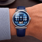 Vortichron Double Roller Blue — Worn on wrist with a blue sleeve, showing the HOUR and MIN rollers, available at IFL Watches.